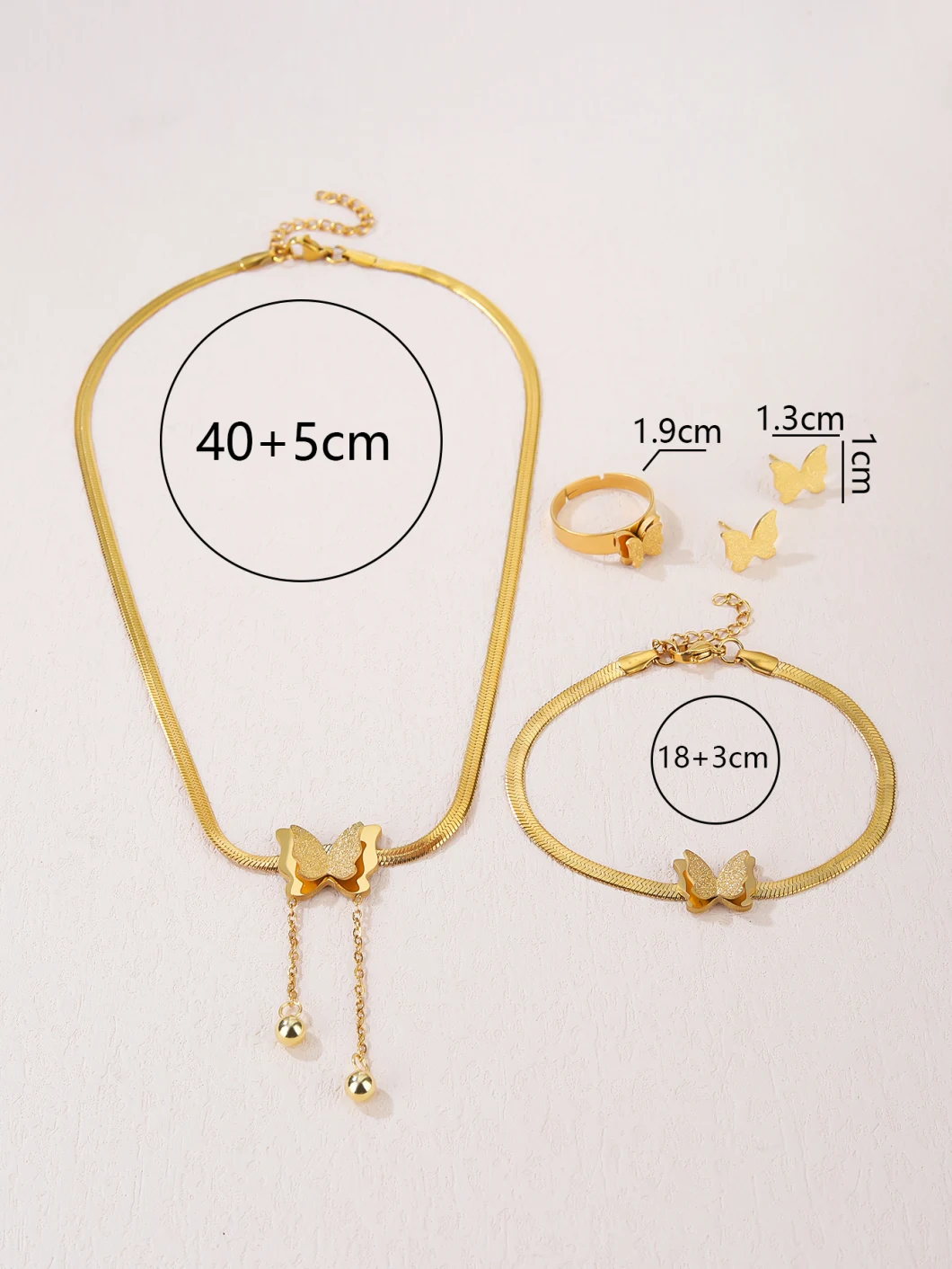 Gold Stainless Steel Butterfly Pendant Necklace and Earrings Bracelet Ring Four-Piece Set